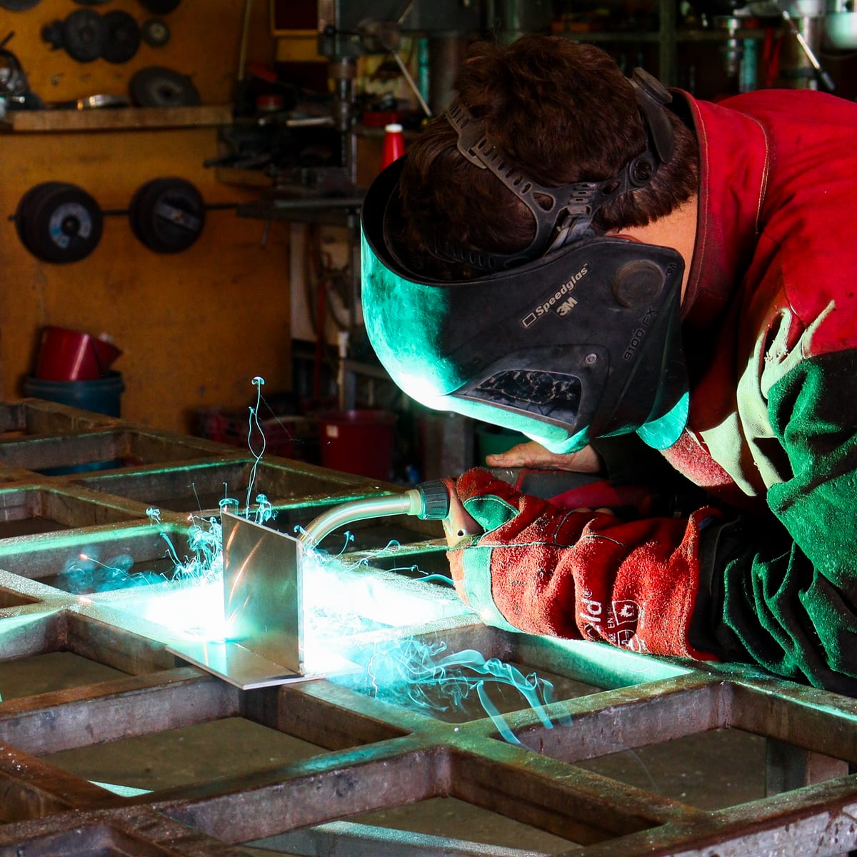 Welding an aluminium fabrication in the Reel Boats workshop